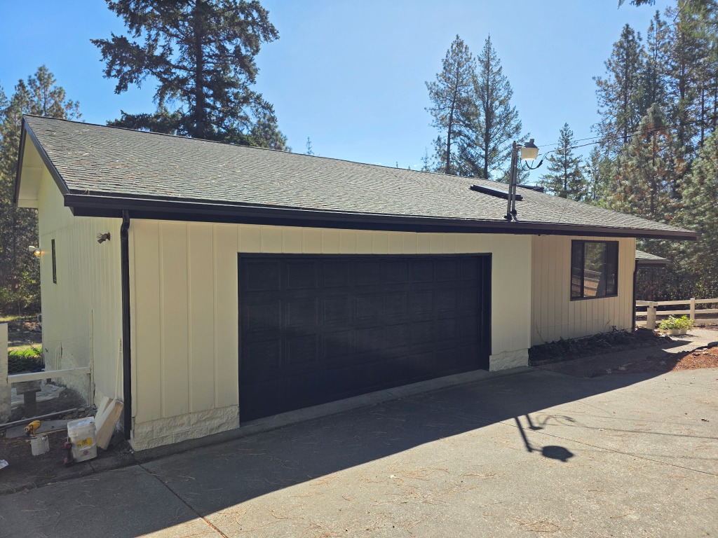 Garage Shop Siding and Black Door Finish